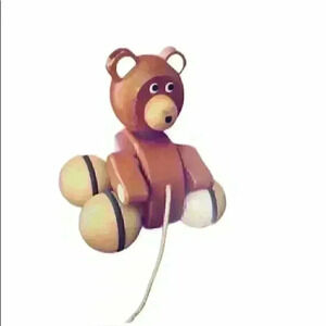 FAO Schwarz brown wooden bear rolling toy baby